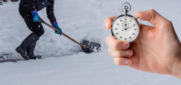 shoveling and hand stopwatch