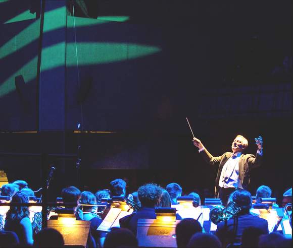 Jim Ripley, a music professor, orchestra conductor, and band director at Carthage College, conducting the Wind Orchestra.